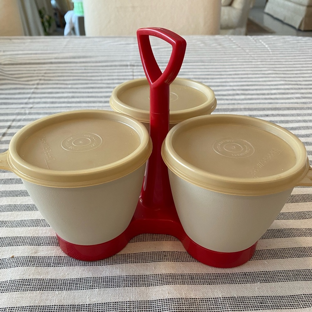 Vintage Tupperware condiment caddy in paprika red.